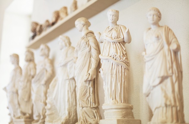 ancient marble statues representing women in Ancient Corinth