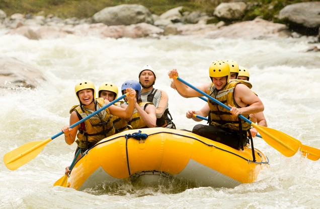 Rafting in Lousios river: Group of people rafting in the rapids of Lucius River