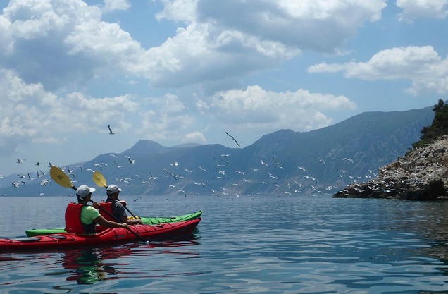 Ancient Sunken City Kayak Tour: two people kayaking in the sea